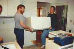 Late-80s-Chris-and-Fred-Hoisting-New-Kitchen-Gift-from-Brother-Bob
